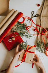 Woman preparing Christmas present